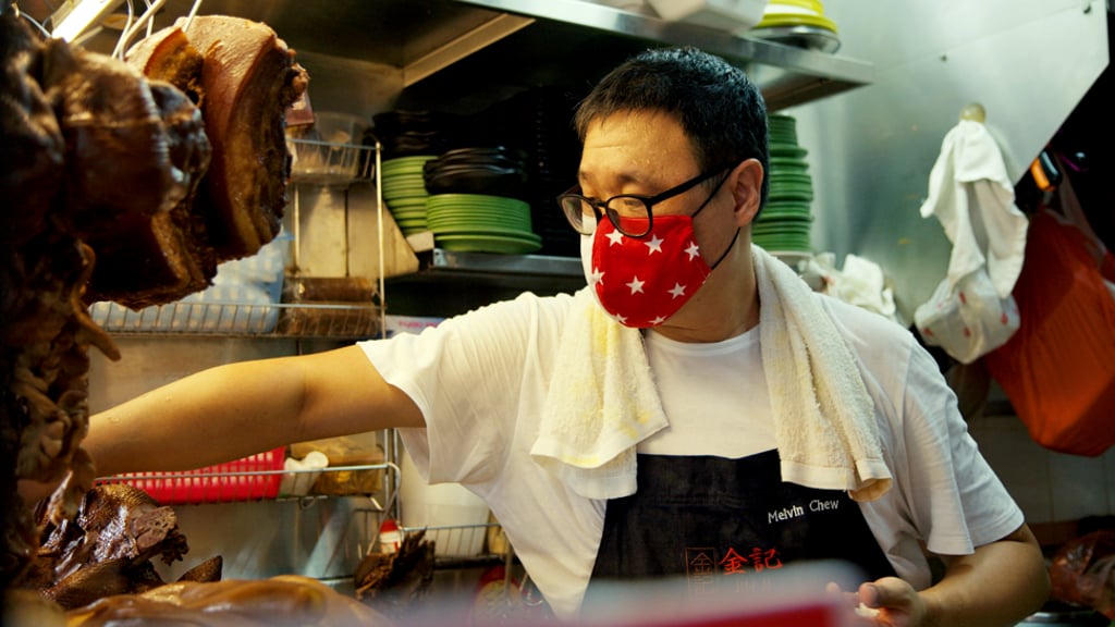 Singapore hawker Melvin Chew works at his family’s Jin Ji Teochew Braised Duck & Kway Chap stall in Chinatown Complex Food Centre. Singapore hawker Melvin Chew works at his family’s Jin Ji Teochew Braised Duck & Kway Chap stall in Chinatown Complex Food Centre.