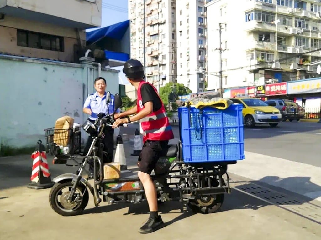 Xu Shengliang rides his bike to deliver parcels in Shanghai. There are plans to expand the team of deaf couriers by the Singles’ Day shopping day. Photo: Weibo Xu Shengliang rides his bike to deliver parcels in Shanghai. There are plans to expand the team of deaf couriers by the Singles’ Day shopping day. Photo: Weibo