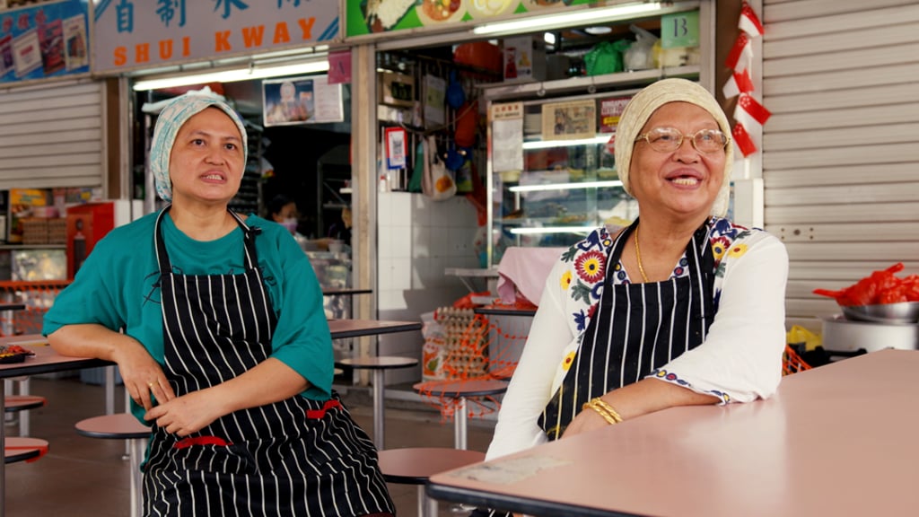 Rahayu Rahman (left) and her mother, Aminah Sanwan, have been serving traditional Malay food at Makan Food Stall in Sembawang Hills Food Centre, Singapore for 18 years. Rahayu Rahman (left) and her mother, Aminah Sanwan, have been serving traditional Malay food at Makan Food Stall in Sembawang Hills Food Centre, Singapore for 18 years.