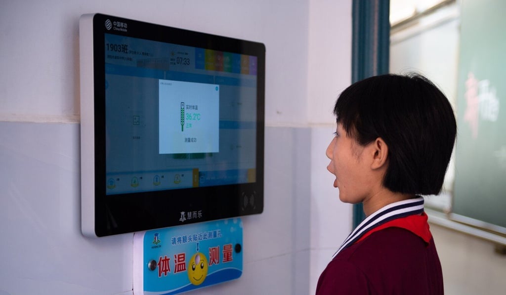 Temperature checks will be part of the school day at campuses across China. Photo: Xinhua