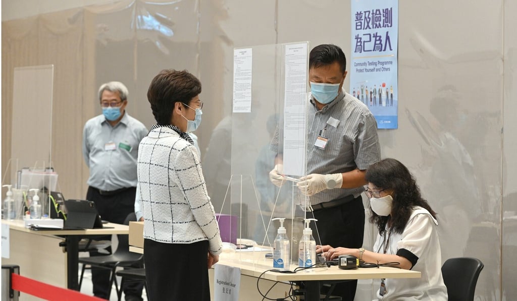 Hong Kong leader Carrie Lam (second left) took the test on Tuesday. Photo: Handout