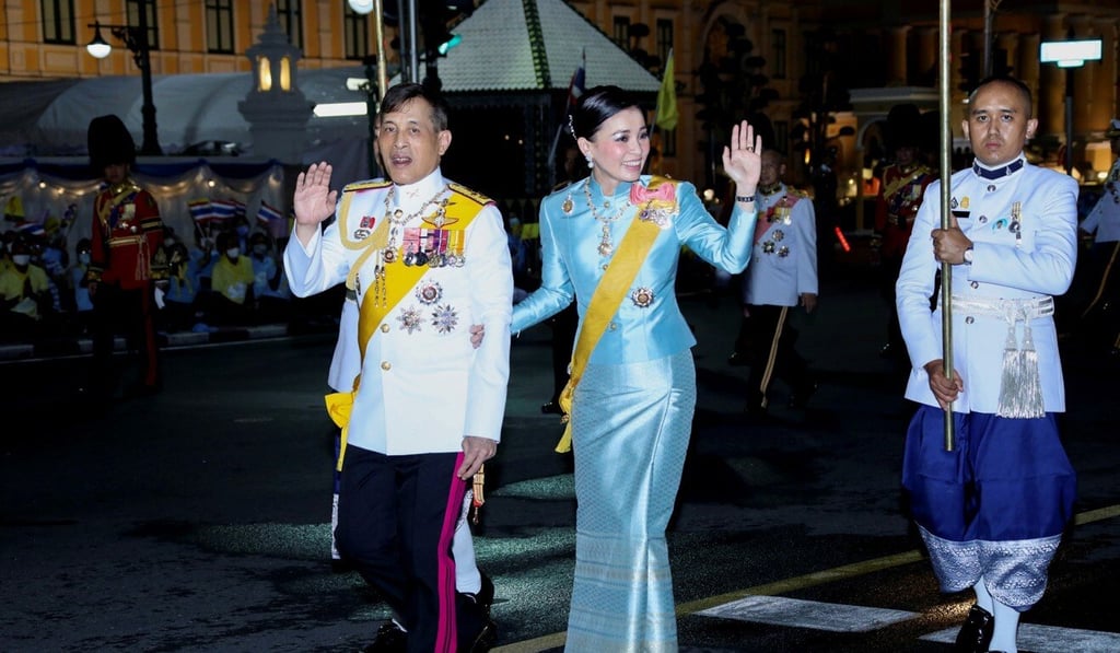 Thailand's King Maha Vajiralongkorn and Queen Suthida wave to well-wishers after a ceremony to celebrate the birthday of Queen Sirikit, the Queen Mother, near the Grand Palace in Bangkok on August 12. Photo: Handout via Reuters Thailand's King Maha Vajiralongkorn and Queen Suthida wave to well-wishers after a ceremony to celebrate the birthday of Queen Sirikit, the Queen Mother, near the Grand Palace in Bangkok on August 12. Photo: Handout via Reuters