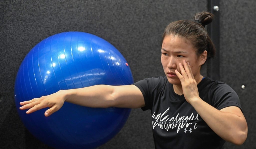 Zhang Weili’s dedication to the sport showcases her desire to represent MMA in the best of lights. Photo: AFP Zhang Weili’s dedication to the sport showcases her desire to represent MMA in the best of lights. Photo: AFP