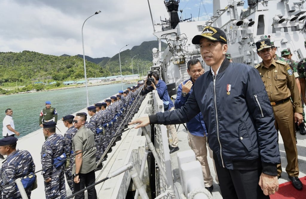 Indonesian President Joko Widodo stands on the deck of an Indonesian navy ship in the Natuna Islands in January 2020. Photo: Indonesian Presidential Office via AP