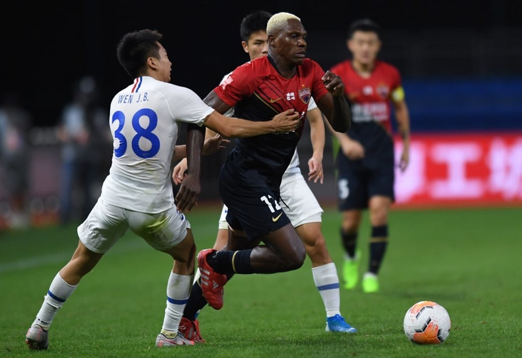 Mary in action against Shenhua. Photo: Xinhua