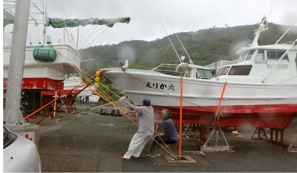 Vessels are taken out of the water at a port in Amami, Kagoshima Prefecture, in preparation for the approaching Typhoon Haishen. Photo: Kyodo Vessels are taken out of the water at a port in Amami, Kagoshima Prefecture, in preparation for the approaching Typhoon Haishen. Photo: Kyodo
