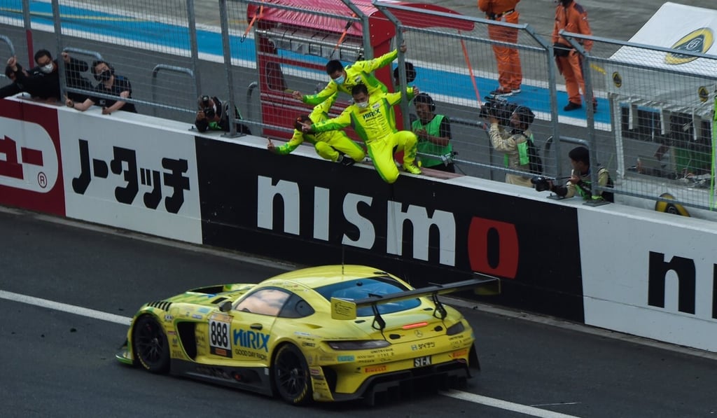 Hong Kong racing car driver Shaun Thong and debuting Mercedes-AMG Team Hirix Racing teammates celebrate after winning the Fuji 24-Hour Super Tec race in Fuji, Japan. Photo: Handout
