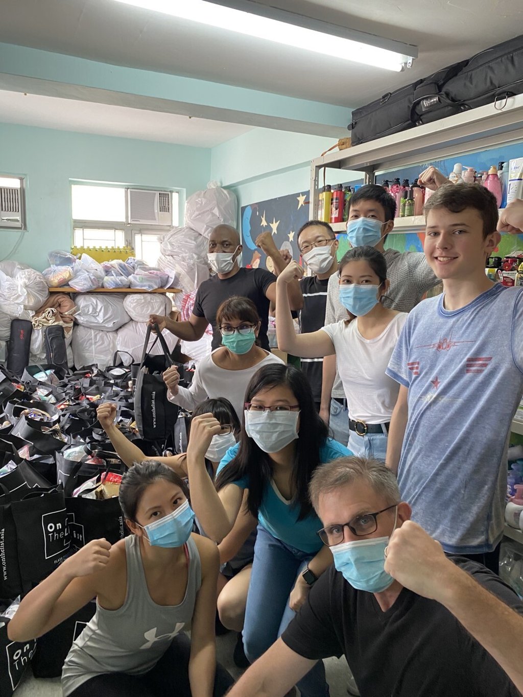 Volunteers get set to make deliveries. Photo: HandsOn Hong Kong