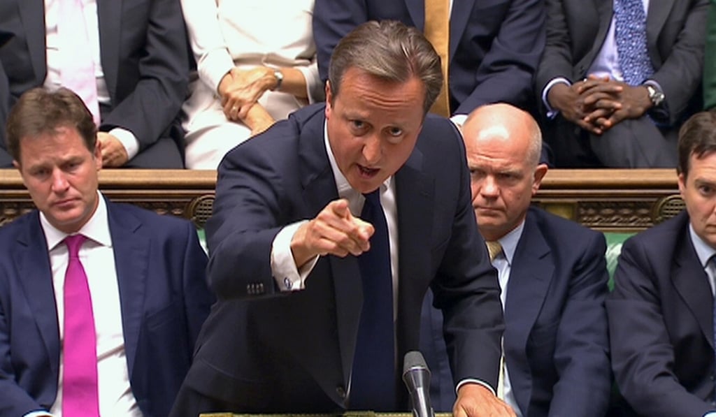 David Cameron addresses Britain’s House of Commons. Photo: Reuters David Cameron addresses Britain’s House of Commons. Photo: Reuters