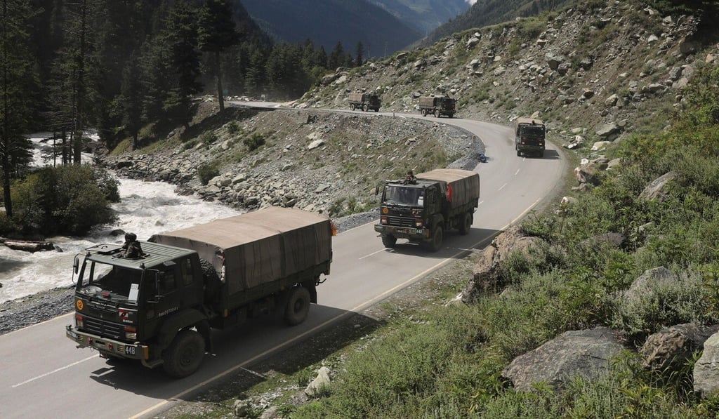 Indian army vehicles move along a highway leading to Ladakh, near the border with China. Photo: EPA Indian army vehicles move along a highway leading to Ladakh, near the border with China. Photo: EPA