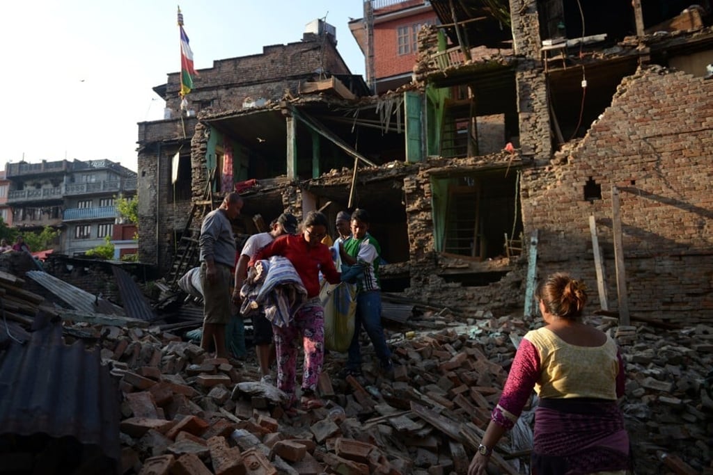 Kathmandu's earthly monuments, damaged by earthquakes, rise