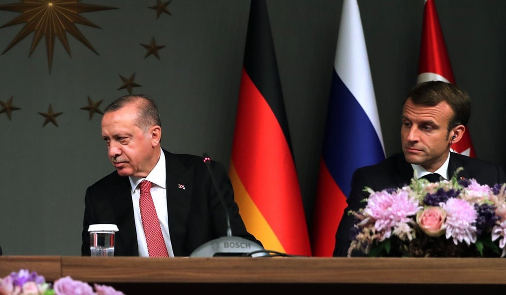 Turkish President Recep Tayyip Erdogan (left) with his French counterpart Emmanuel Macron. Photo: AP