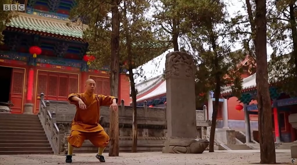 A monk trains on the grounds of the Shaolin Temple in the BBC's Sacred Wonders documentary. Photo: BBC