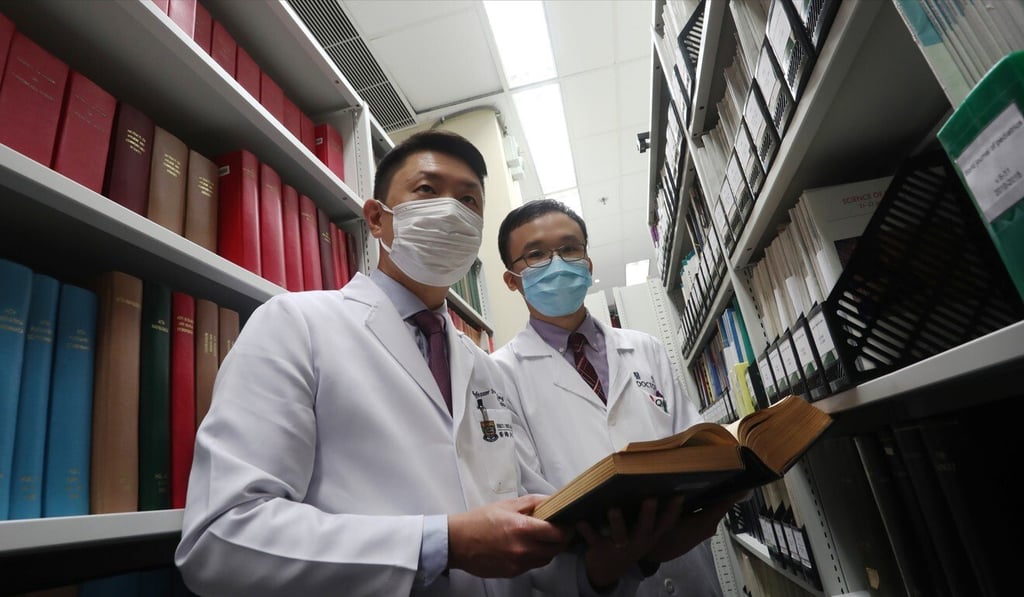 Dr Antony Tam (right) alongside his mentor Professor Ivan Hung at Queen Mary Hospital, in Pok Fu Lam. Photo: Jonathan Wong