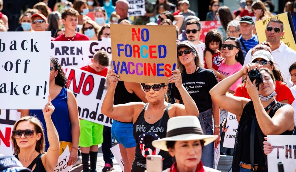 US President Donald Trump has not disavowed the faceless, headless movement. Photo: AFP