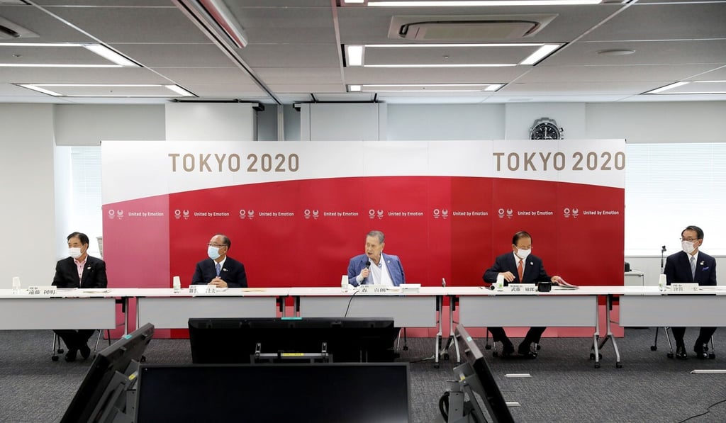 Executives from the Tokyo Olympics organising committee speak at a press conference in Japan. Photo: Xinhua