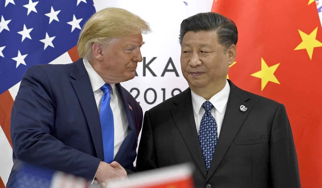 US President Donald Trump shakes hands with Chinese President Xi Jinping during a meeting on the sidelines of the G-20 summit in Osaka, Japan. Photo: AP US President Donald Trump shakes hands with Chinese President Xi Jinping during a meeting on the sidelines of the G-20 summit in Osaka, Japan. Photo: AP