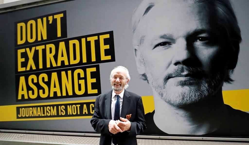 John Shipton, the father of Wikileaks founder Julian Assange, poses for a photograph as he arrives at the Old Bailey court in central London. Photo: AFP