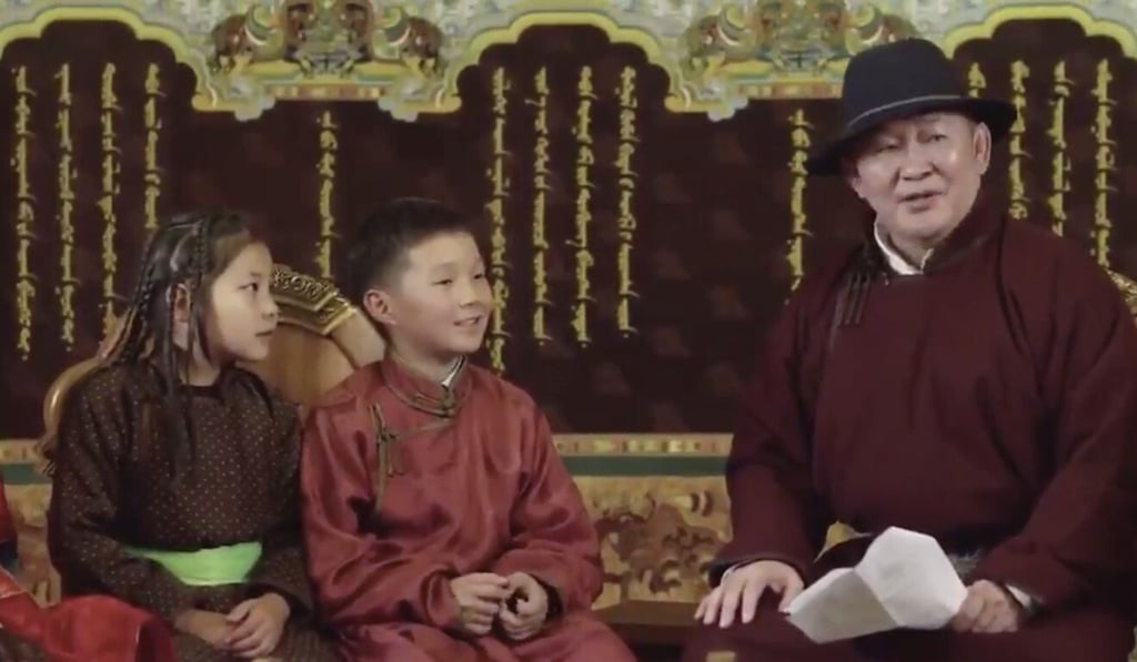 Mongolian President Khaltmaagiin Battulga appears on national television with schoolchildren reciting a poem by an Inner Mongolian poet on September 1. Photo: Twitter