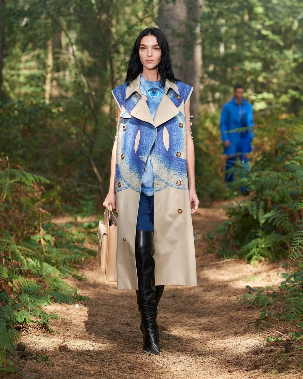 Tisci’s trench coat embraces the elements of a beach “mixing with the sand and the water”. Burberry/Handout via Reuters