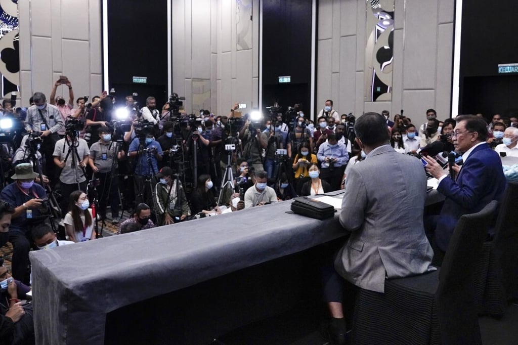Anwar Ibrahim, right, speaks at a press conference in Kuala Lumpur on September 23, 2020. Photo: AP