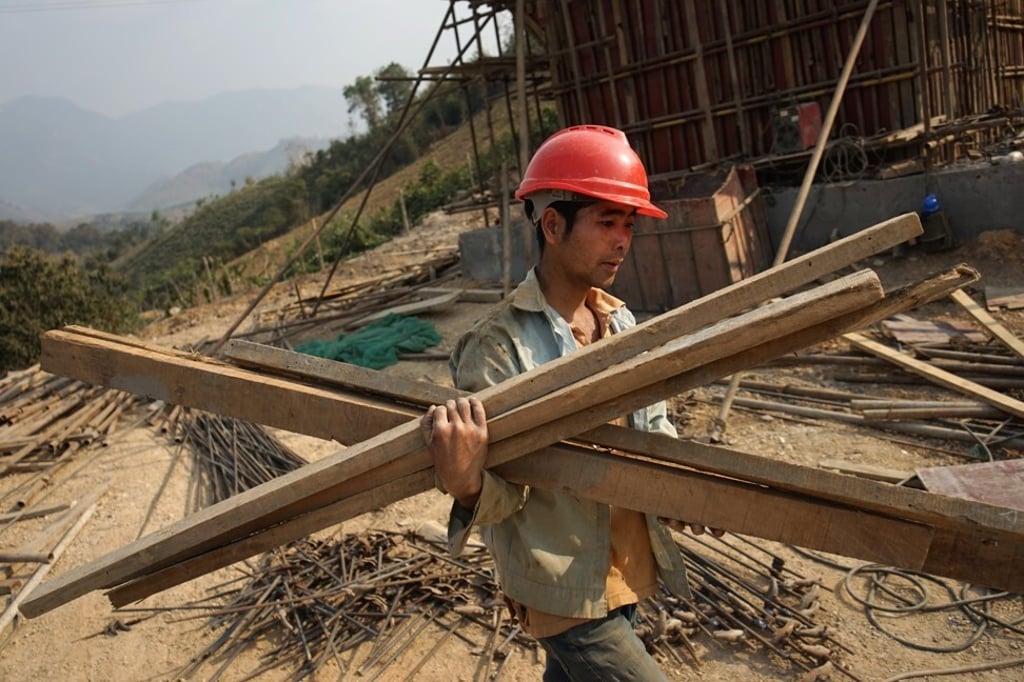 A Chinese labourer working on the China-Laos railway in February this year. Photo: AFP