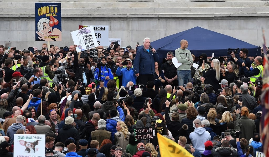 British Conspiracy theorist David Icke speaks to a large crowd at a ‘We Do Not Consent’ rally in Trafalgar Square in London on Saturday. Photo: EPA-EFE British Conspiracy theorist David Icke speaks to a large crowd at a ‘We Do Not Consent’ rally in Trafalgar Square in London on Saturday. Photo: EPA-EFE