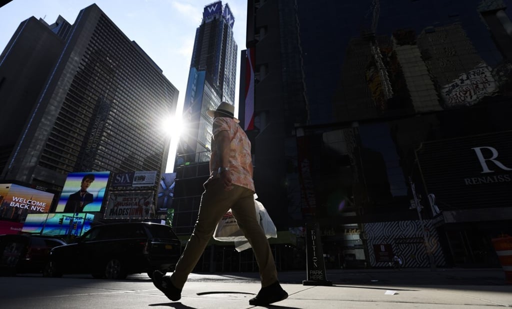 A person walks through a quiet Times Square in New York on August 24. At minus 1 per cent in the second quarter, America’s net national savings rate has entered negative territory for the first time since the 2008 global financial crisis. Photo: EPA-EFE A person walks through a quiet Times Square in New York on August 24. At minus 1 per cent in the second quarter, America’s net national savings rate has entered negative territory for the first time since the 2008 global financial crisis. Photo: EPA-EFE