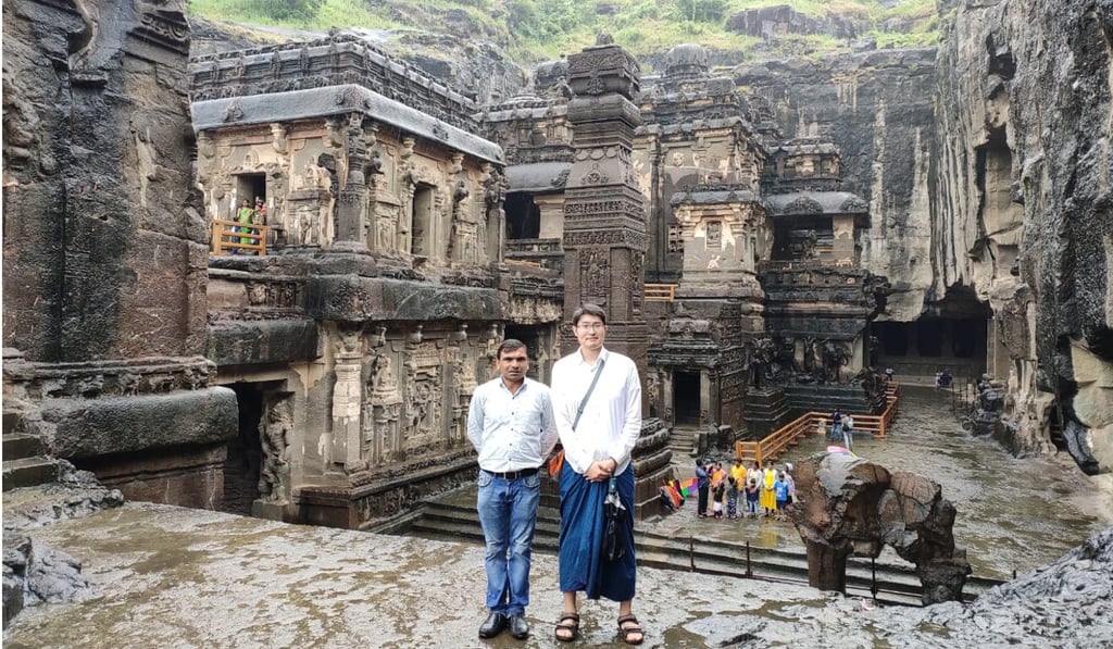 Kavde with a tourist at Kailasa Temple, Ellora. Photo: Pankaj Kavde Kavde with a tourist at Kailasa Temple, Ellora. Photo: Pankaj Kavde