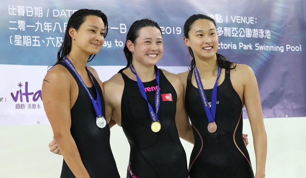 Siobhan Haughey (centre) and her teammates, Camille Cheng (left) and Tam Hoi-lam at the 2019 Hong Kong Open Championships at Victoria Park Swimming Pool. Photo: Edward Wong Siobhan Haughey (centre) and her teammates, Camille Cheng (left) and Tam Hoi-lam at the 2019 Hong Kong Open Championships at Victoria Park Swimming Pool. Photo: Edward Wong