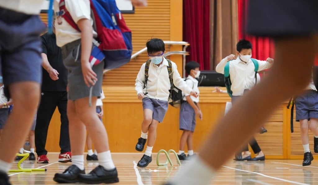 Staff at Ying Wa Primary School set up a mini-obstacle course for pupils on their first day back. Photo: Winson Wong