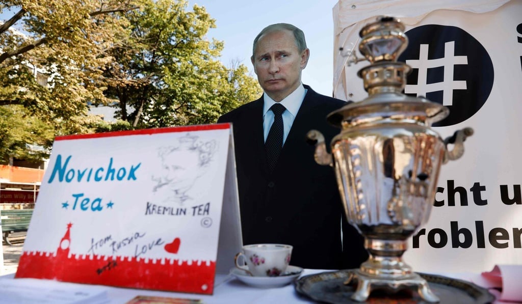 A mock offer of “Novichok Tea” is placed in front of an effigy of Russian President Vladimir Putin outside the Russian embassy in Berlin on September 23. Photo: AFP A mock offer of “Novichok Tea” is placed in front of an effigy of Russian President Vladimir Putin outside the Russian embassy in Berlin on September 23. Photo: AFP
