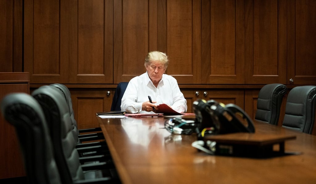 US President Donald Trump works in a conference room while receiving treatment for Covid-19 at Walter Reed National Military Medical Center in Bethesda, Maryland, on Saturday. Photo: Reuters
