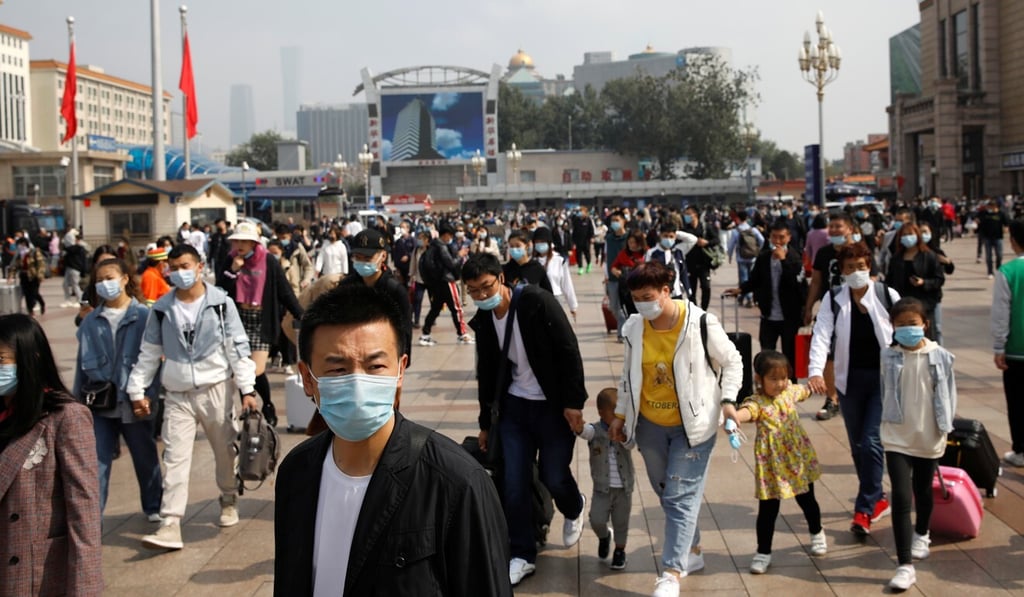 China’s railway authority said it expected to handle 14.8 million passengers on Thursday. Photo: Reuters
