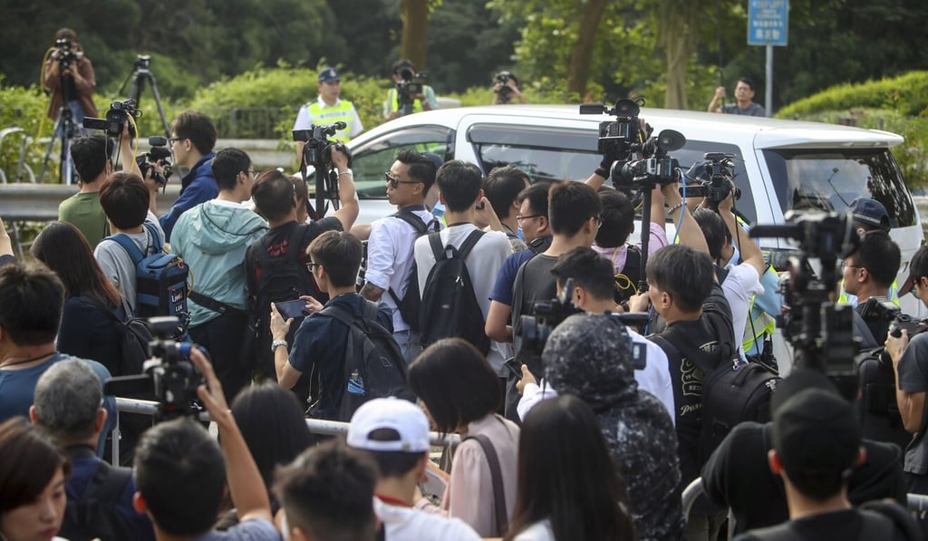 Members of the press follow murder suspect Chan Tong-Kai's vehicle from Pik Uk Prison to King's Park Hill in Kowloon in October 2019. Photo: Winson Wong