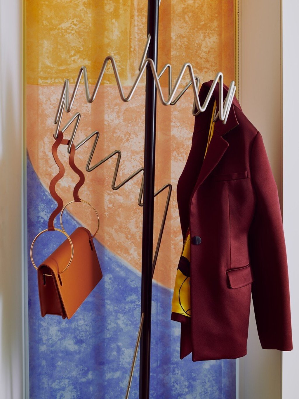 The entranceway features a quirky coat rack and striking use of colour on the walls. Photo: Michael Sinclair The entranceway features a quirky coat rack and striking use of colour on the walls. Photo: Michael Sinclair