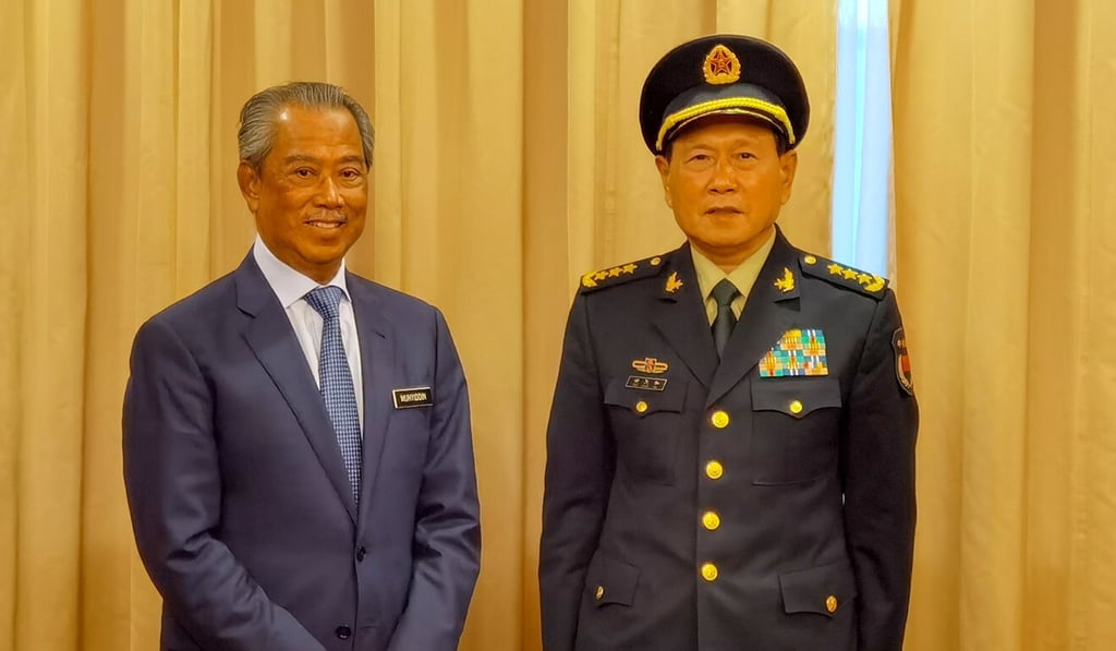 Malaysian Prime Minister Muhyiddin Yassin, left, pictured with Chinese Defence Minister Wei Fenghe in Kuala Lumpur last month. Photo: Xinhua Malaysian Prime Minister Muhyiddin Yassin, left, pictured with Chinese Defence Minister Wei Fenghe in Kuala Lumpur last month. Photo: Xinhua