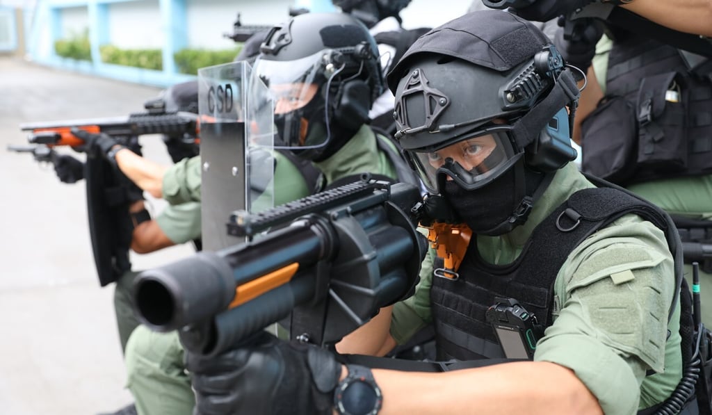 The new riot gun allows officers to shoot six sponge-tipped rounds containing pepper powder. Photo: Nora Tam The new riot gun allows officers to shoot six sponge-tipped rounds containing pepper powder. Photo: Nora Tam