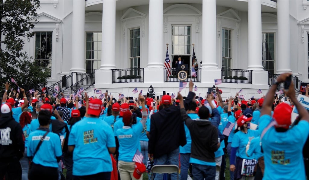 Trump supporters on the South Lawn during the US president's campaign rally on Saturday. Photo: Reuters