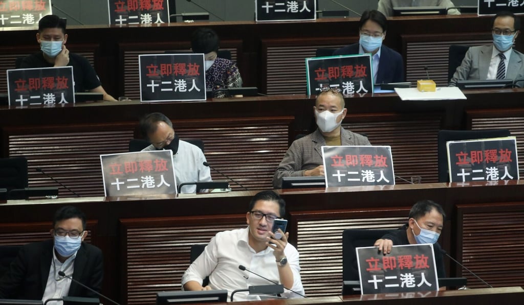 Pan-democrats display protest signs during a meeting of Legco’s Finance Committee in September. Photo: Sam Tsang