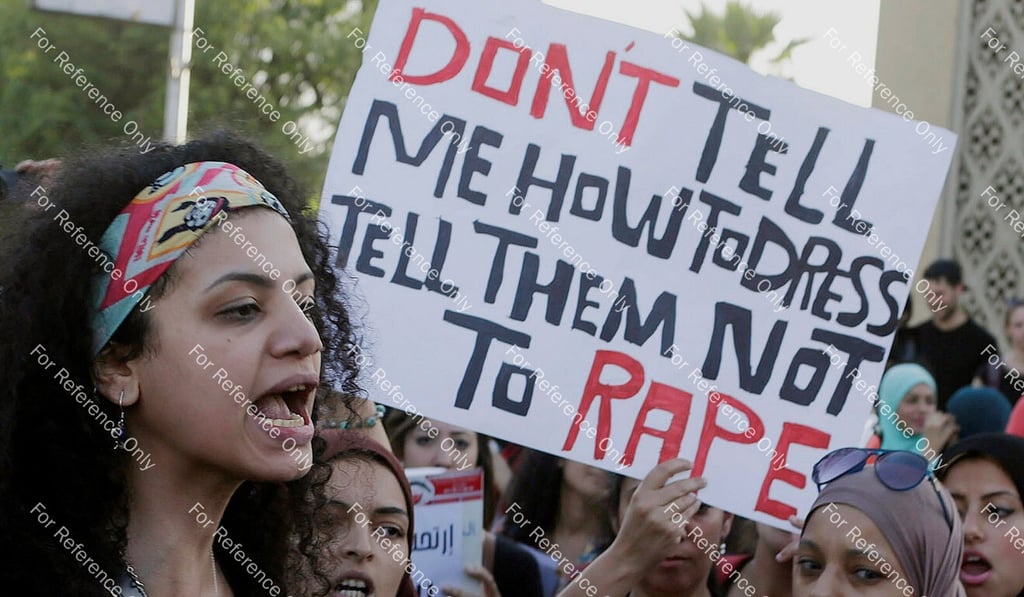 Women chant slogans as they gather to protest against sexual harassment in front of the opera house in Cairo in June 2014. Photo: Reuters