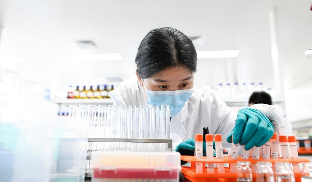 An engineer in a laboratory built to produce a Covid-19 coronavirus vaccine at Sinovac in China. Photo: AFP