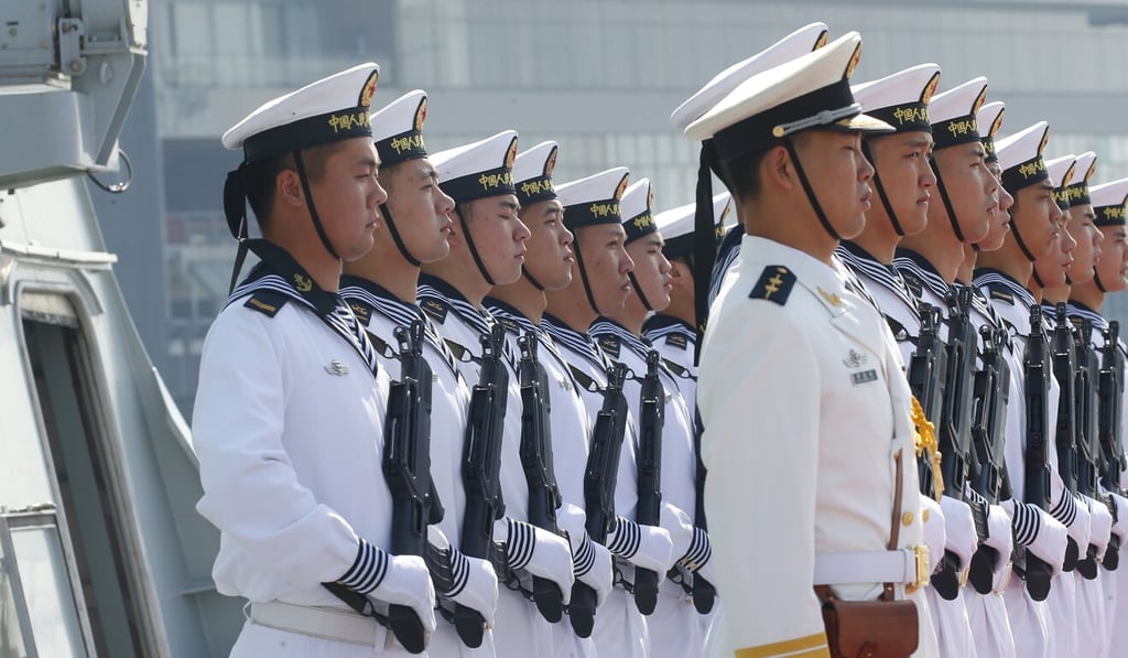 Chinese sailors on the deck of a type 054A guided missile frigate in Manila's South Harbor. Esper said China and Russia had become “near-peer rivals” of the US and adequate budgets were needed to face the challenges. Photo: AP Chinese sailors on the deck of a type 054A guided missile frigate in Manila's South Harbor. Esper said China and Russia had become “near-peer rivals” of the US and adequate budgets were needed to face the challenges. Photo: AP