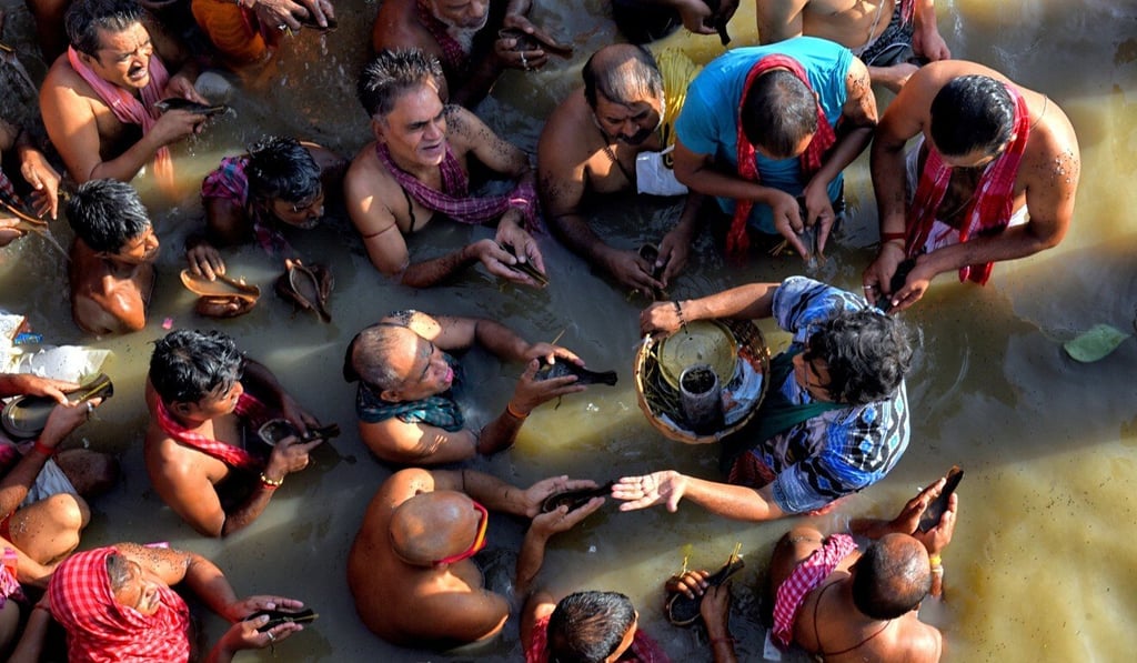 Hindus perform rituals in the Ganges to mark the start of the Durga Puja festival. File photo Hindus perform rituals in the Ganges to mark the start of the Durga Puja festival. File photo