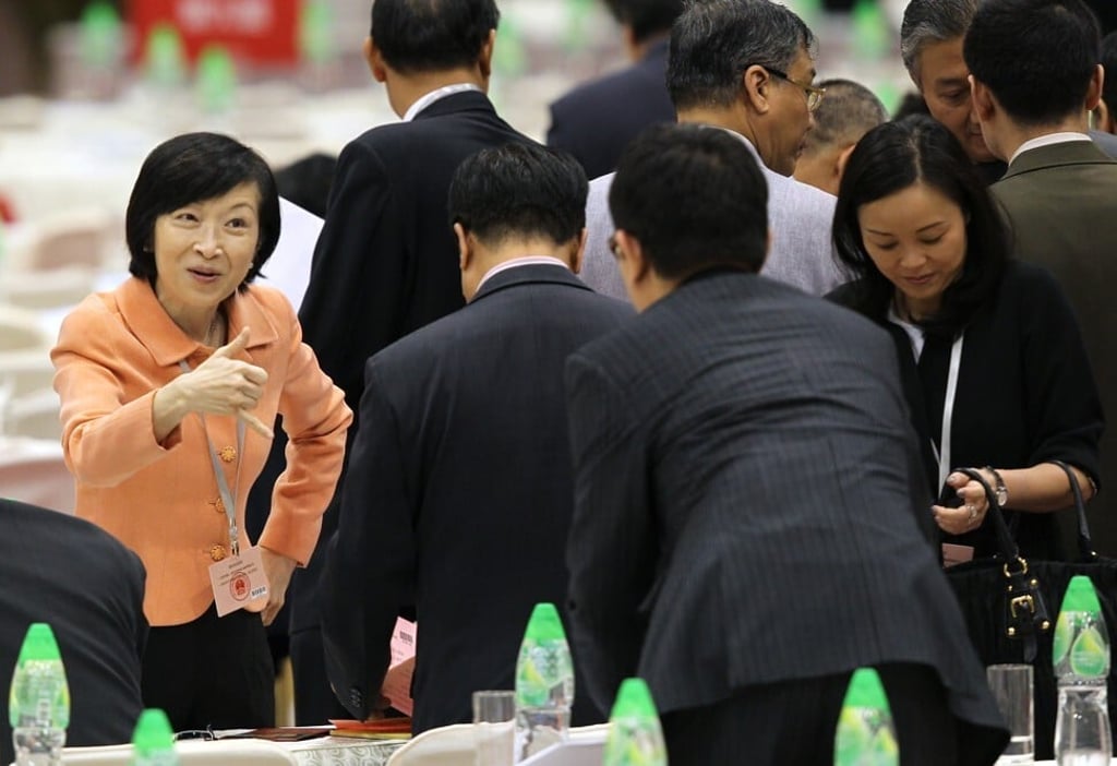 Fanny Law Fan Chiu-fun, left, attends the election meeting of Hong Kong deputies to the National People‘s Congress at the Hong Kong Convention and Exhibition Centre in November 2012. Law is the only woman to serve as Hong Kong’s education secretary, though her tenure was also the shortest in the history of the office. Photo: SCMP Fanny Law Fan Chiu-fun, left, attends the election meeting of Hong Kong deputies to the National People‘s Congress at the Hong Kong Convention and Exhibition Centre in November 2012. Law is the only woman to serve as Hong Kong’s education secretary, though her tenure was also the shortest in the history of the office. Photo: SCMP