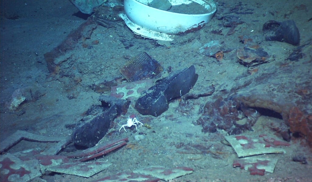 A 2004 image shows the shoes of one of the possible victims on the Titanic. Photo: University of Rhode Island/NOAA Office of Ocean Exploration handout via AP