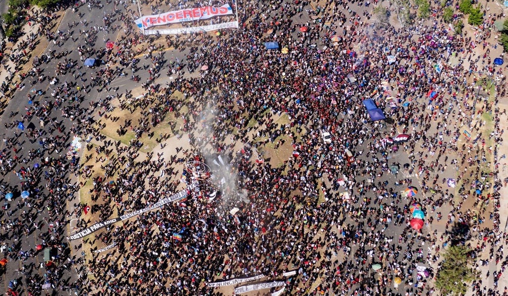 Protesters gathered in the central square of the capital, Santiago. Photo: AFP