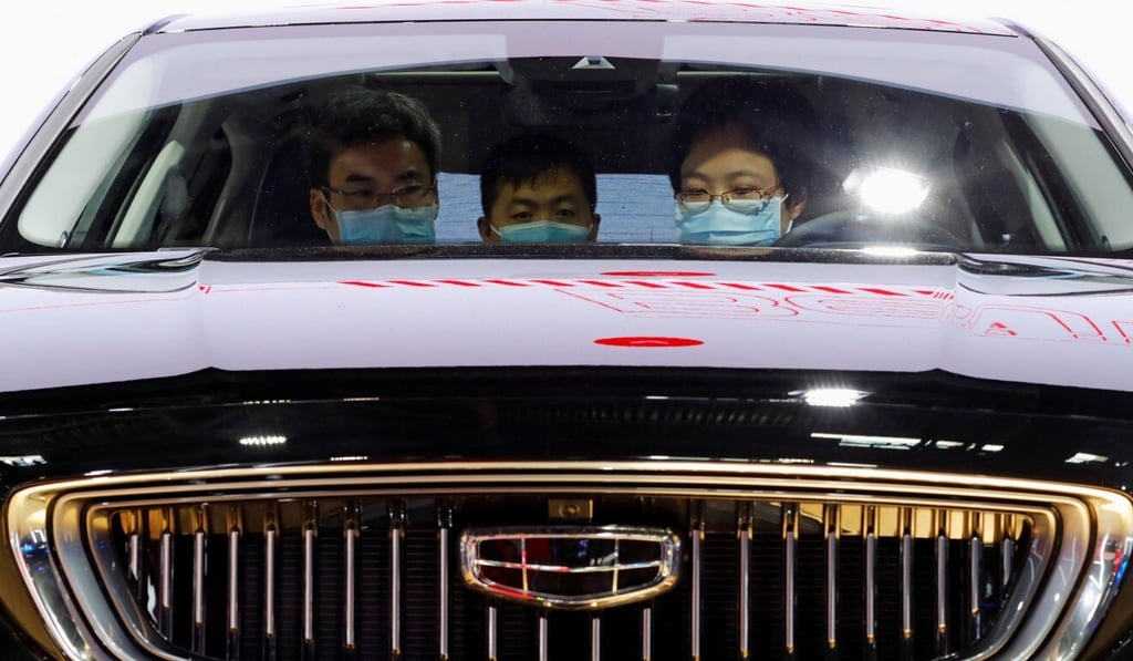 Visitors wearing face masks look at a Geely Preface at the Auto China show, in Beijing last month. Geely is looking to raise funds on Shanghai’s Star Market. Photo: Reuters Visitors wearing face masks look at a Geely Preface at the Auto China show, in Beijing last month. Geely is looking to raise funds on Shanghai’s Star Market. Photo: Reuters