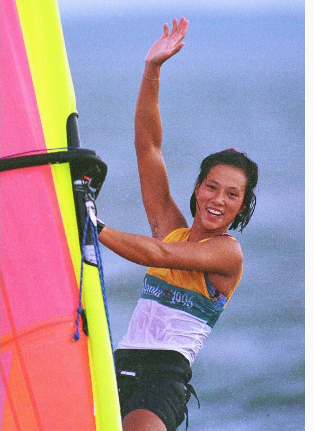 Lee Lai-shan waves after winning her class, and the gold medal. Photo: Gary Caskey/Reuters Lee Lai-shan waves after winning her class, and the gold medal. Photo: Gary Caskey/Reuters