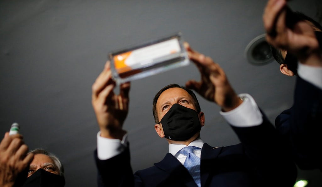 Brazil's Sao Paulo state governor Joao Doria holds a box of the Sinovac coronavirus vaccine candidate during a news conference in Brasilia on Wednesday. Photo: Reuters Brazil's Sao Paulo state governor Joao Doria holds a box of the Sinovac coronavirus vaccine candidate during a news conference in Brasilia on Wednesday. Photo: Reuters